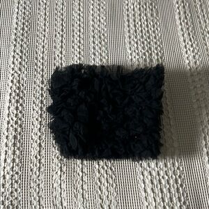 Elegant Black Ruffled Clutch